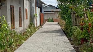 Pemdes Pahaleten Kakas Paving Jalan Desa, Akses Warga Makin Lancar